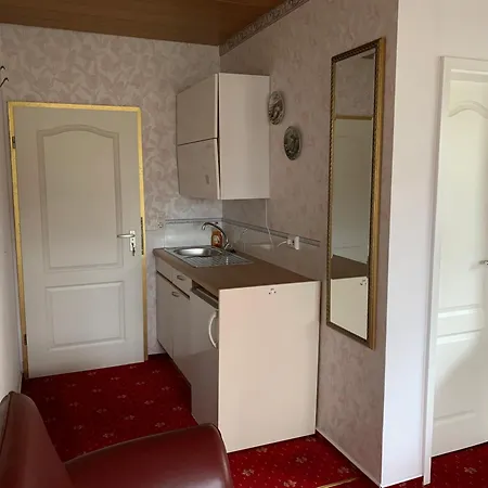 Quarto em Acomodações Particulares Gaestehaus Am Lindenweg